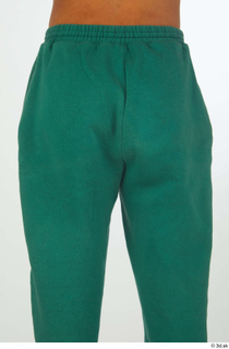 Nathaniel buttock dressed green jogging pants sports thigh 0003.jpg